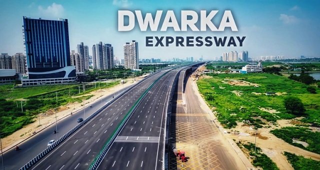 "An aerial view of Dwarka Expressway showcasing urban evolution in Gurgaon with residential and commercial developments, highlighting economic growth and modern infrastructure."